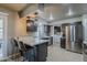 A well-equipped kitchen features stainless steel appliances, ample cabinet space, and a convenient breakfast bar at 11135 W Cameo Dr, Sun City, AZ 85351