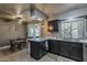 The kitchen seamlessly connects to a dining area, creating a harmonious space for cooking and enjoying meals at 11135 W Cameo Dr, Sun City, AZ 85351