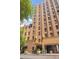 Exterior shot of the building, highlighting its facade, architectural style, and street-level view at 114 W Adams St # 202, Phoenix, AZ 85003