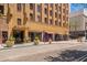 Street-level view of the building's exterior, showing its architecture, windows, and sidewalk details at 114 W Adams St # 202, Phoenix, AZ 85003