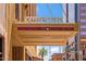 Close-up of the building's ornate entrance and signage, offering a glimpse of the surrounding cityscape at 114 W Adams St # 202, Phoenix, AZ 85003
