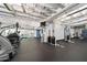 Spacious gym features cardio machines, weight training equipment, and a view of the pool at 114 W Adams St # 202, Phoenix, AZ 85003