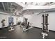 Well-equipped gym with weight machines, free weights, and a dedicated workout area at 114 W Adams St # 202, Phoenix, AZ 85003