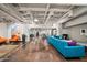 Relaxing lounge area with ample seating, modern decor, and concrete flooring at 114 W Adams St # 202, Phoenix, AZ 85003