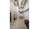 Walk-in closet featuring custom shelving, ample storage, and modern lighting at 114 W Adams St # 202, Phoenix, AZ 85003