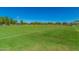 Well-maintained baseball field, a green space perfect for sports and community activities at 1201 E Campbell Ave, Gilbert, AZ 85234