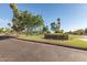 Entrance sign to Freestone Park, showcasing lush landscaping and inviting community atmosphere at 1201 E Campbell Ave, Gilbert, AZ 85234