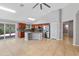 Bright kitchen featuring stainless appliances, a large island, and sliding door access to the backyard at 1201 E Campbell Ave, Gilbert, AZ 85234