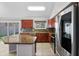 Well-appointed kitchen featuring stainless steel appliances and granite countertops at 1201 E Campbell Ave, Gilbert, AZ 85234