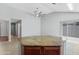 Well-appointed kitchen featuring a center island and tile flooring at 1201 E Campbell Ave, Gilbert, AZ 85234