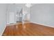 Spacious living room featuring wood floors, neutral paint and an open concept at 1201 E Campbell Ave, Gilbert, AZ 85234