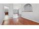 Spacious living room featuring wood floors and neutral paint at 1201 E Campbell Ave, Gilbert, AZ 85234