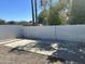 Spacious backyard featuring block fencing and desert landscaping to enjoy outdoor living at 1309 E Julie Dr, Tempe, AZ 85283