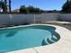 Sparkling in-ground pool with step entry and white fencing provides a relaxing outdoor oasis at 1309 E Julie Dr, Tempe, AZ 85283