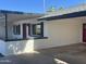 Exterior angle showing covered porch area and an outdoor carport at 1309 E Julie Dr, Tempe, AZ 85283