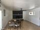 Cozy living room with fireplace and dining area perfect for Gathering gatherings at 1309 E Julie Dr, Tempe, AZ 85283