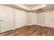 A secondary bedroom provides ample storage space with 3 closets in view at 1331 W Baseline Rd # 167, Mesa, AZ 85202