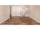 Plank floors compliment the bedrooms closet and attached bathroom at 1331 W Baseline Rd # 167, Mesa, AZ 85202