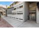 Exterior view of a well-maintained apartment building featuring balconies, stucco walls, and convenient access to walkways at 1331 W Baseline Rd # 167, Mesa, AZ 85202