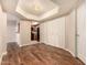 Spacious open-concept living room with wood-look flooring and direct access to kitchen at 1331 W Baseline Rd # 167, Mesa, AZ 85202