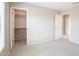 Neutral bedroom with a spacious closet, offering convenient storage at 15229 S 18Th Dr, Phoenix, AZ 85045