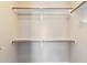 Closet features open shelving for optimal organization and easy access at 15229 S 18Th Dr, Phoenix, AZ 85045