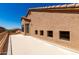 Back of house featuring a balcony and desert landscaping at 15229 S 18Th Dr, Phoenix, AZ 85045