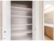 Pantry features spacious shelving, perfect for storing household items and snacks at 15229 S 18Th Dr, Phoenix, AZ 85045