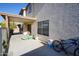 The home's backyard with a covered patio, backyard items and a bike at 1750 E Erie St, Gilbert, AZ 85295