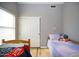 Neutral bedroom with two twin beds, and a large closet at 1750 E Erie St, Gilbert, AZ 85295