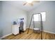 Neutral bedroom with a desk, hanging chair, and bright window at 1750 E Erie St, Gilbert, AZ 85295