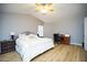 Spacious main bedroom featuring a comfortable bed with decorative pillows and a dedicated workspace at 1750 E Erie St, Gilbert, AZ 85295