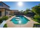 Sparkling pool with plenty of room for activities in a large backyard at 1750 E Erie St, Gilbert, AZ 85295