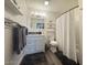Well-lit bathroom with a shower and modern vanity with updated fixtures at 1801 N 87Th Pl, Scottsdale, AZ 85257