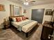 Relaxing bedroom with a king bed, plush carpeting, and ample storage, providing a comfortable haven at 1801 N 87Th Pl, Scottsdale, AZ 85257