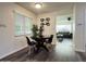 Cozy breakfast nook with a dark wood table and comfortable seating at 1801 N 87Th Pl, Scottsdale, AZ 85257