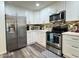 Beautiful kitchen with stainless steel appliances and ample counter space at 1801 N 87Th Pl, Scottsdale, AZ 85257
