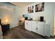 Well-equipped kitchenette featuring a microwave, mini fridge, and sink with modern cabinetry at 1801 N 87Th Pl, Scottsdale, AZ 85257