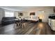 Bright living area featuring two beds, dining table, and a comfortable sofa at 1801 N 87Th Pl, Scottsdale, AZ 85257