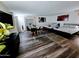 This light and airy living room features hardwood floors, dining area, and comfortable furnishings at 1801 N 87Th Pl, Scottsdale, AZ 85257
