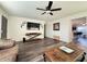 Spacious living area featuring a ceiling fan and hardwood floors at 1801 N 87Th Pl, Scottsdale, AZ 85257