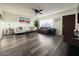 Bright living room with modern flooring, ceiling fan and comfortable seating at 1801 N 87Th Pl, Scottsdale, AZ 85257