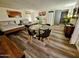 This spacious living room features a dining area, modern decor, and comfortable furnishings at 1801 N 87Th Pl, Scottsdale, AZ 85257