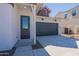 Charming single-Gathering home featuring a two-car garage, contrasting trim, and low maintenance desert landscaping at 18047 W Long Lake Rd, Goodyear, AZ 85338
