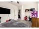 The bedroom features a fan and closet space at 18241 W Foothill Dr, Surprise, AZ 85387
