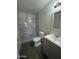 Modern bathroom featuring a tiled walk-in shower and an updated vanity at 2045 E Orange St, Tempe, AZ 85281