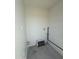 A utility room is shown featuring white walls and basic hookups at 2045 E Orange St, Tempe, AZ 85281