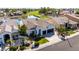 Desirable aerial view showcasing lush landscaping, water features, and mature palm trees at 21480 N 56Th Ave, Glendale, AZ 85308