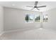 Bright bedroom offering scenic views of the lake at 21480 N 56Th Ave, Glendale, AZ 85308