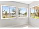 Bedroom with three windows overlooking the waterfront at 21480 N 56Th Ave, Glendale, AZ 85308